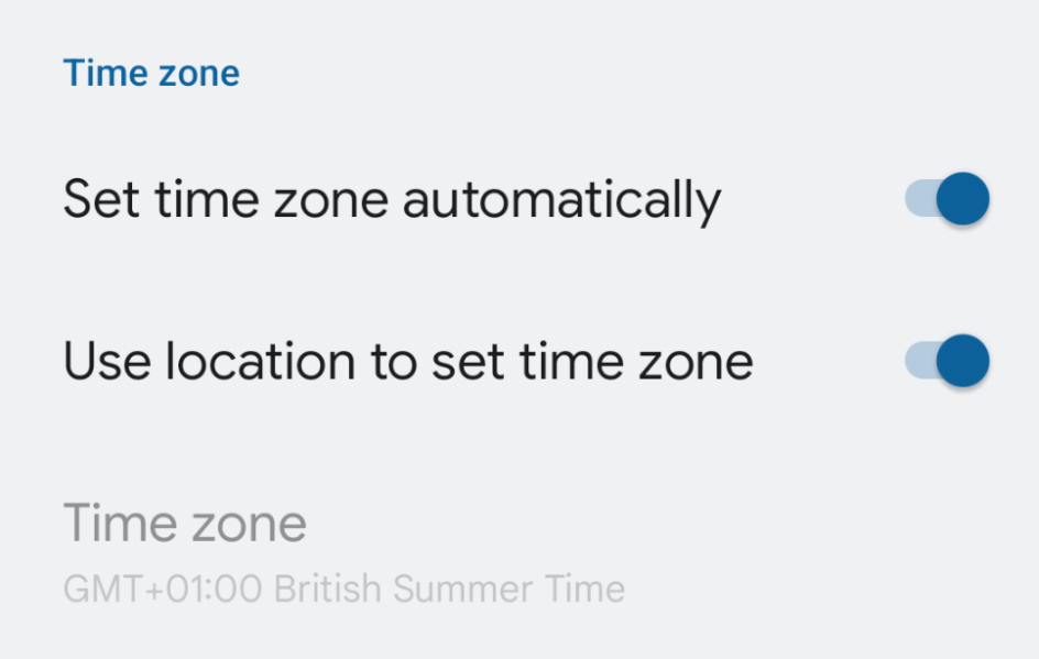 Deteksi zona waktu otomatis di Setelan